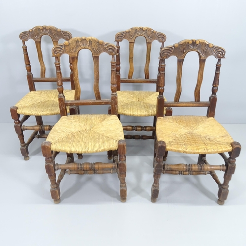 2006 - A set of four French rush seated farmhouse dining chairs.