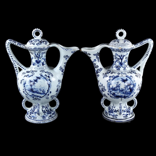 10 - A pair of 19th century Delft blue and white pottery ewers, makers mark under base, height 37cm