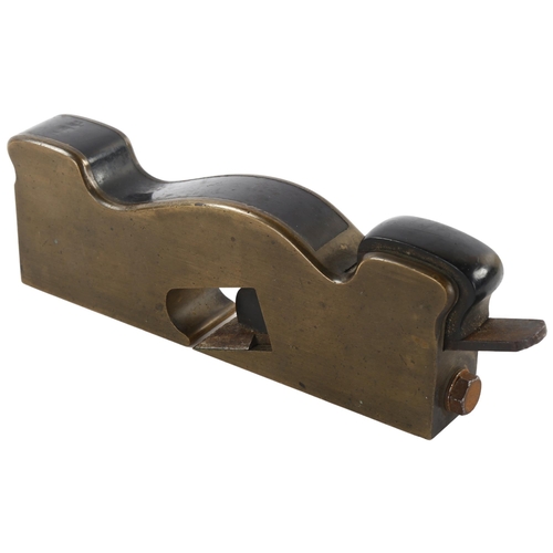 13 - A Badger of London bronze shoulder plane with ebony fittings, made prior to 1867, with maker's stamp... 