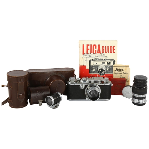 4 - A 1936 Leica IIIa camera, serial No 188801,  a TEWE variable viewfinder, A Leica telephoto lens seri... 