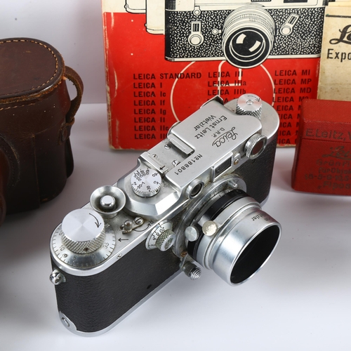 4 - A 1936 Leica IIIa camera, serial No 188801,  a TEWE variable viewfinder, A Leica telephoto lens seri... 