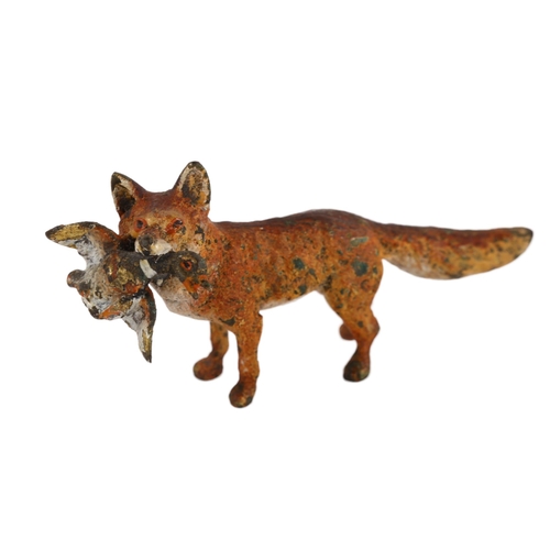 113 - A cold painted bronze miniature of fox with pheasant, length 5cm