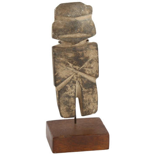 120 - A pre-Columbian hardstone carved figure on mounted wood and metal stand, height of figure 13cm