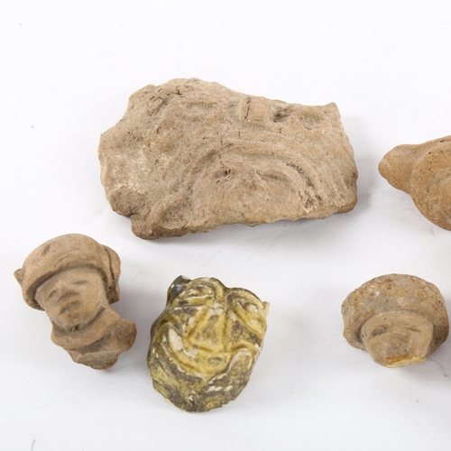 121 - 7 pre-Columbian ceramic faces, largest 6.5cm