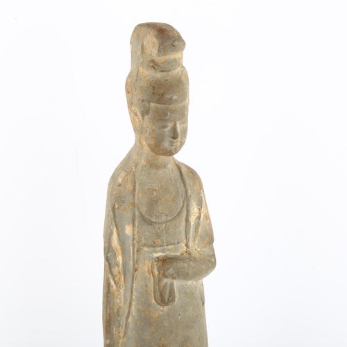 123 - A Chinese ceramic funerary figure on wooden stand, height 29cm