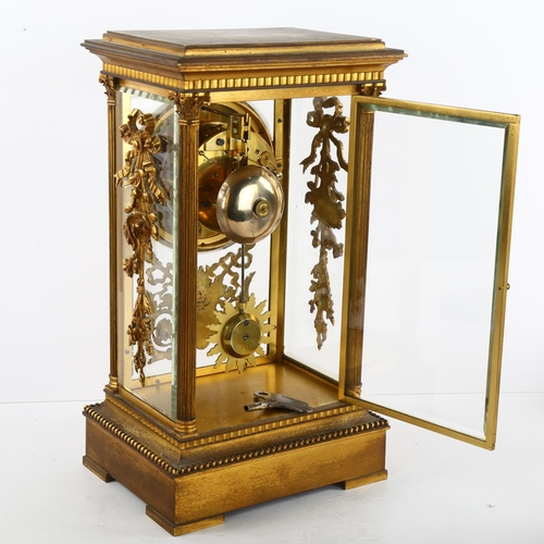 124 - A mid 19th century French Four Glass clock by Raingo Feres, Paris,  8 day movement, case has bevelle... 