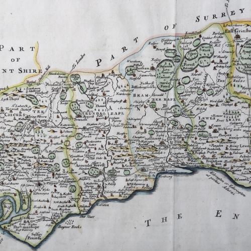 127 - A hand coloured map of Sussex by Robert Morden, framed, 44 x 54 cm