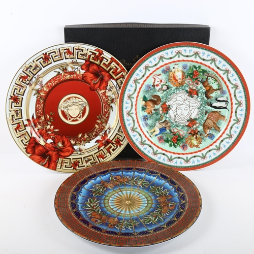 72 - A collection of 21 Versace designed limited edition Christmas wall plates for Rosenthal Studio-Line,... 