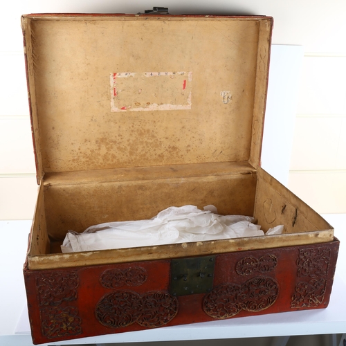 79 - An early 20th century suitcase, with red lacquer finish and applied chinoiserie decoration, dimensio... 