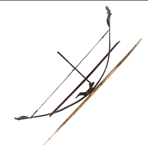 86 - A rosewood cross-bow, early 20th century, another bow, and 2 bamboo spears