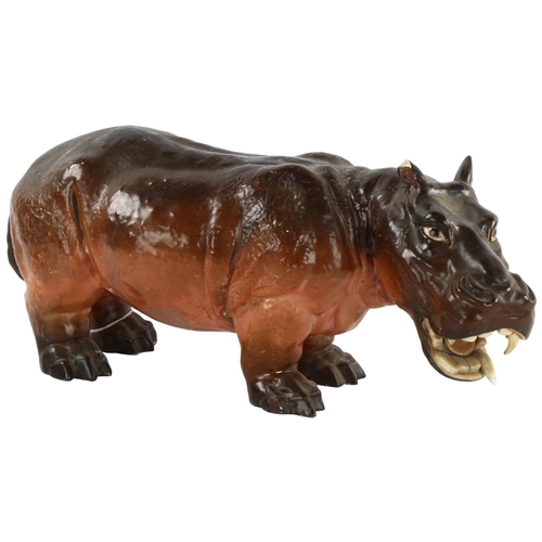 90 - A 19th century porcelain hippopotamus, makers stamp to foot, length 36cm A/F