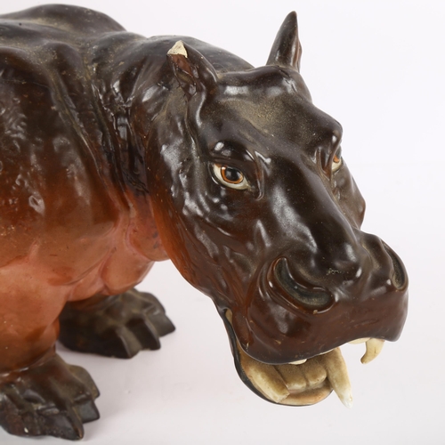 90 - A 19th century porcelain hippopotamus, makers stamp to foot, length 36cm A/F