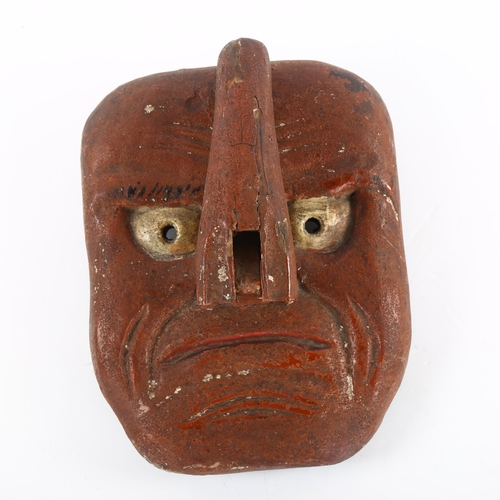 96 - An Antique Japanese wood carved Noh wall mask of Tengu with articulated nose, length 19cm