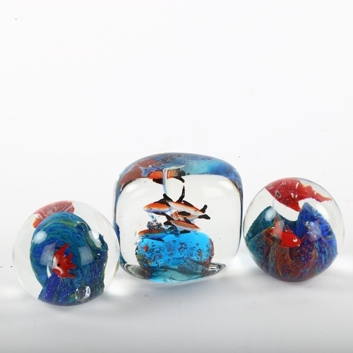 156 - 3 Murano style glass paperweights with fish decoration, tallest 7.5cm