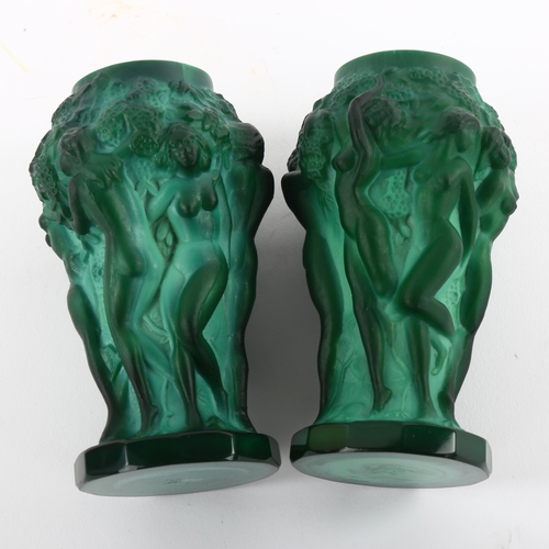 159 - A pair of malachite pressed glass vases, in the style of Lalique, featuring 6 nudes around grapevine... 