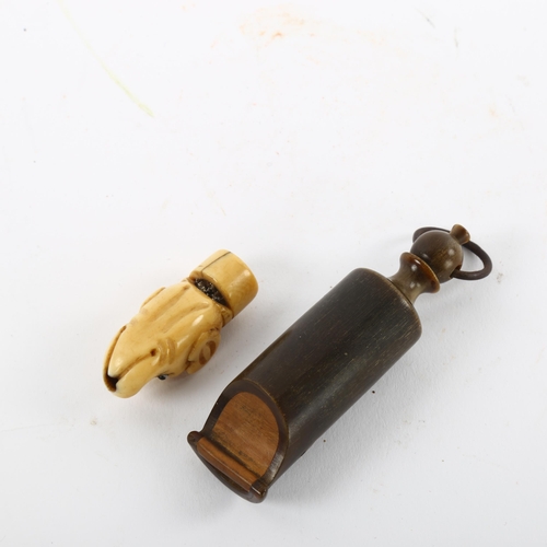 166 - An Antique bone dog's head whistle, and a turned horn whistle