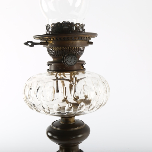 169 - An early 19th century opaline glass oil lamp with cut glass well, stamped Hinks & Sons, height 85cm