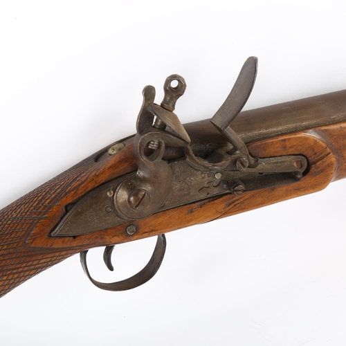 178 - An Indian brass barrel flintlock blunderbuss, overall length 88cm