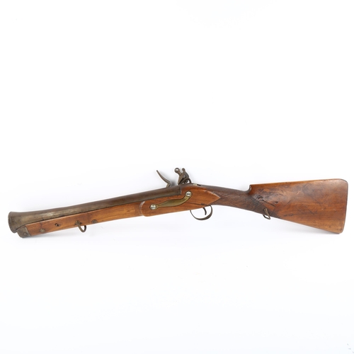 178 - An Indian brass barrel flintlock blunderbuss, overall length 88cm