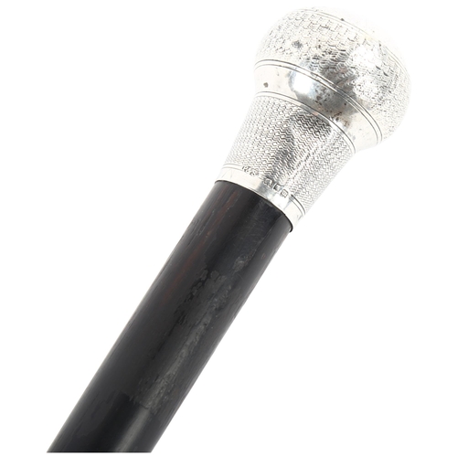 183 - A silver-topped ebony walking cane, hallmarks 1927 London, length 89cm