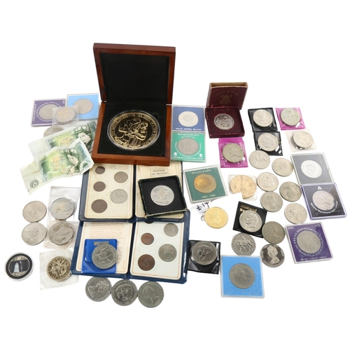 185 - A collection of British commemorative coins, including Festival of Britain crowns, and 88mm Royal ba... 