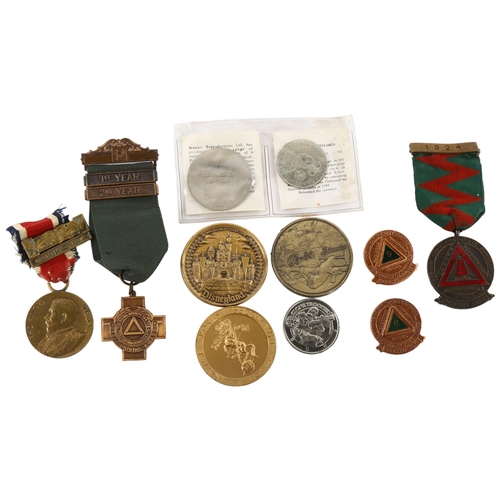 187 - A small collections of medals and medallions, including London County Council and Driver's medals