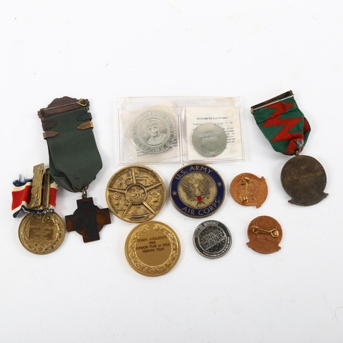 187 - A small collections of medals and medallions, including London County Council and Driver's medals