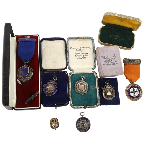 188 - A collection of 8 silver medals and awards, including scouting and sporting interest