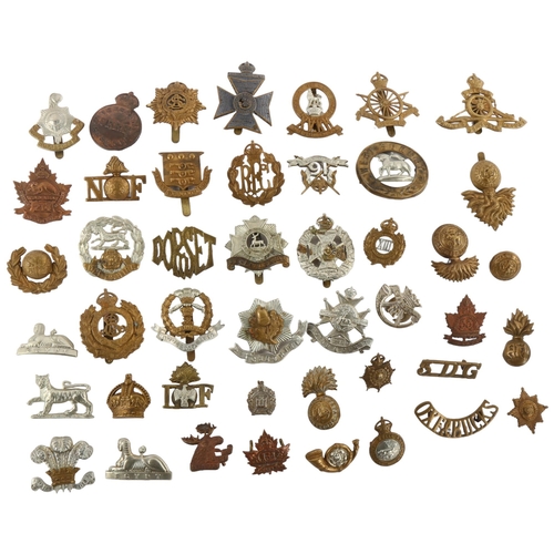 199 - Military interest -A collection of mostly early 20th Century British cap badges, over 40 in total