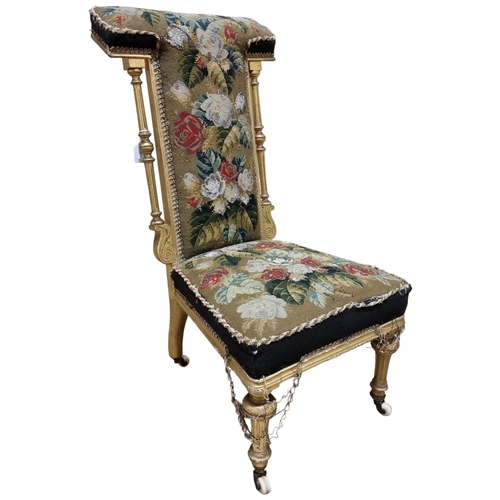 174 - A 19th century giltwood French prayer chair with tapestry upholstery, height 90cm