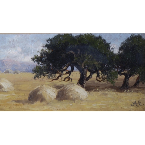 567 - Alfred East (1844 - 1913), haystacks, oil on board, signed with monogram, 6cm x 21cm, framed