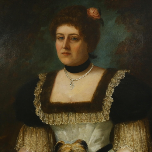 696 - 19th century oil on canvas, portrait of a woman with a Terrier, unsigned, 102cm x 76cm, unframed