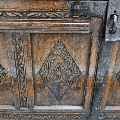 202 - An Italian 18th century walnut Cassonne, carved detail to front and sides, 128 x 60cm, height 58cm