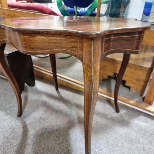 203 - An 20th century marquetry and inlaid centre table, with drawer under, and brass edging to top and le... 