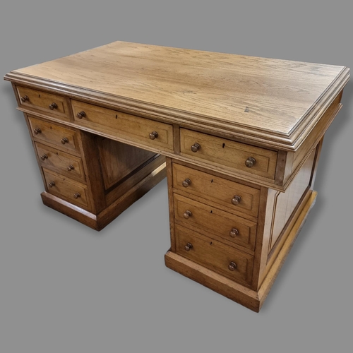 206 - A Victorian oak partners desk, with 3 drawers either side of top, pedestals have drawers and cupboar... 