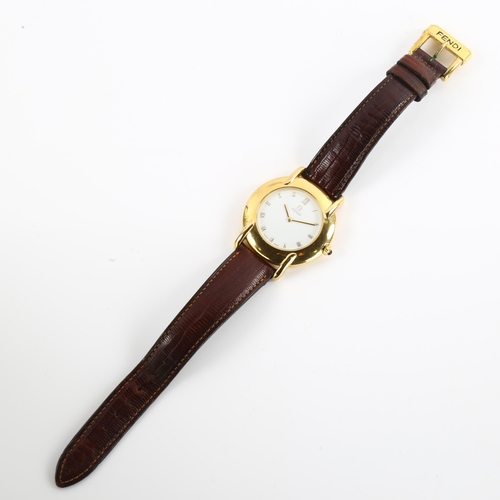 1003 - FENDI - a gold plated 410G quartz wristwatch, white dial with gilt Roman numeral hour markers, seria... 