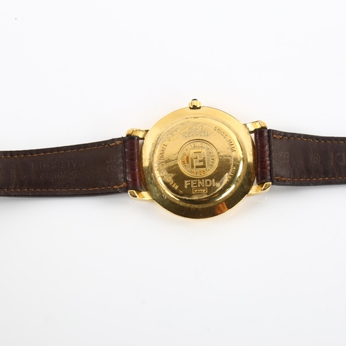 1003 - FENDI - a gold plated 410G quartz wristwatch, white dial with gilt Roman numeral hour markers, seria... 