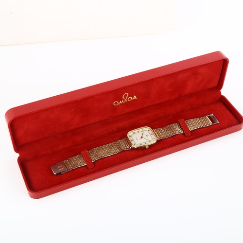 1012 - OMEGA - a gold plated stainless steel De Ville quartz bracelet watch, ref. 1417, cream dial with Rom... 