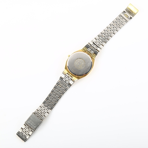 1019 - OMEGA - a gold plated stainless steel De Ville quartz bracelet watch, ref. 1332, champagne dial with... 