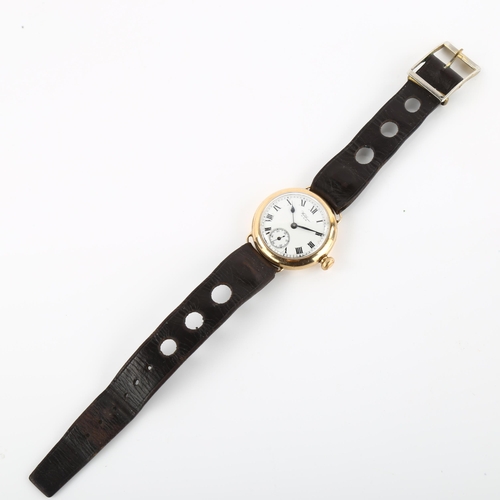 1020 - WALTHAM - an early 20th century 9ct gold Officer's trench wristwatch, white enamel dial with Roman n... 