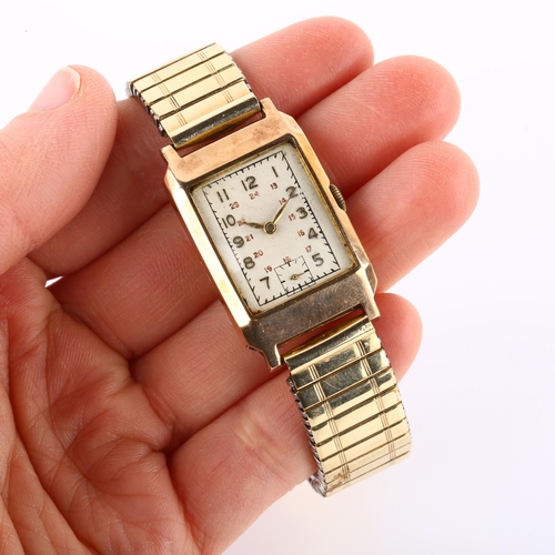 1021 - An Art Deco 9ct gold mechanical bracelet watch, silvered dial with gilt Arabic numerals and subsidia... 