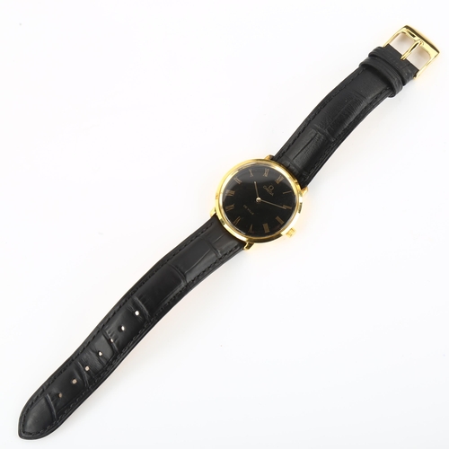 1027 - OMEGA - a gold plated De Ville mechanical wristwatch, ref. 111.077, circa 1969, black dial with gilt... 