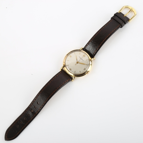 1036 - IWC (INTERNATIONAL WATCH CO) - a Vintage 18ct gold mechanical wristwatch, circa 1950s, silvered dial... 