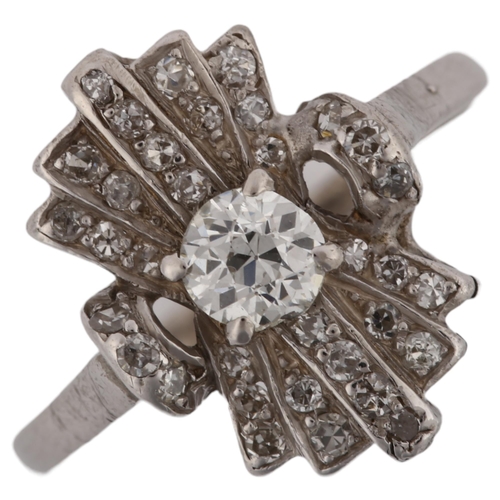 1104 - An Art Deco diamond fan cocktail ring, unmarked white metal geometric settings with old European and... 