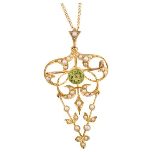 1110 - An Edwardian peridot and pearl openwork pendant necklace/brooch, with V-shaped drop and 9ct fine fla... 