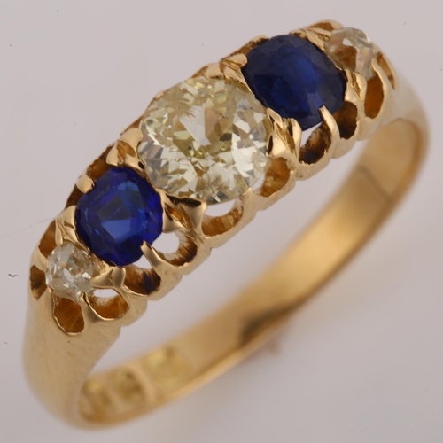 1113 - An 18ct gold graduated five stone sapphire and diamond half hoop ring, set with old European and old... 