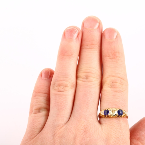 1113 - An 18ct gold graduated five stone sapphire and diamond half hoop ring, set with old European and old... 