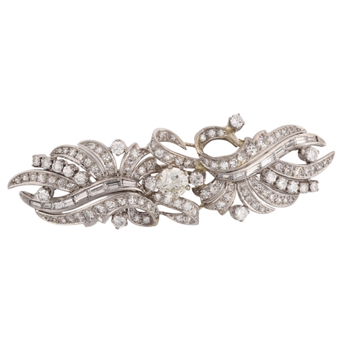 1114 - A fine Belle Epoque diamond brooch, ribbon design set with modern round brilliant and baguette-cut d... 