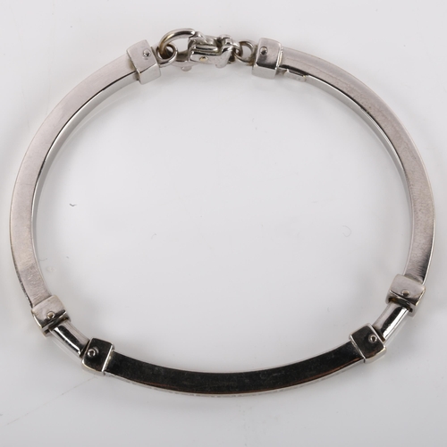 1115 - An Italian 18ct white gold Greek Key bracelet, segmented form, band width 4mm, bracelet length 18cm,... 