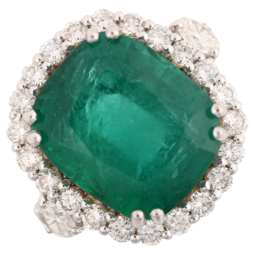 1122 - A modern 18ct white gold emerald and diamond cluster ring, set with 6.5ct oval cushion-cut emerald a... 